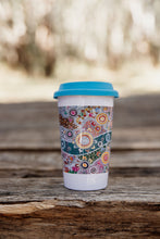 Load image into Gallery viewer, These Wiradjuri Art ceramic Keep Cups / Travel Mugs come printed with the Wiradjuri River People artwork. Cups are sold individually with the lid colour of your choice. There are three lid colours available - Blue, Pink and Orange. Indigenous Art Aboriginal Art First Nations Art
