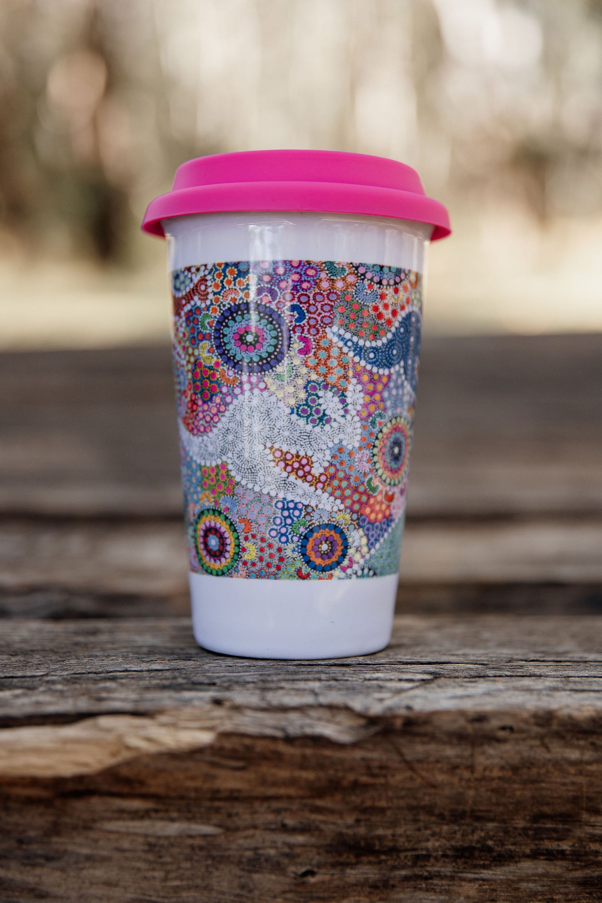 These Wiradjuri Art ceramic Keep Cups / Travel Mugs come printed with the Kangaroo Dreaming 2 artwork. Cups are sold individually with the lid colour of your choice. There are three lid colours available - Blue, Pink and Orange. Indigenous Art Aboriginal Art First Nations Art